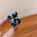 Mini bear hair claw clip in black and white marble acetate with gold branding - Cow Print