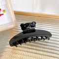 Glossy black bear hair claw clip with sparkling rhinestones for stylish hair styling - Bright Black