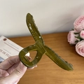 Pinza per capelli in resina verde oliva traslucida con molla dorata e design circolare - Verde
