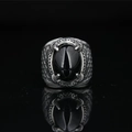 Vintage dragon claw ring for men featuring oval black agate stone on a reflective surface - US 7 / Steel Black