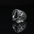 Vintage punk herenring met ovale zwarte onyx en klauwzetting van zilverkleurig edelstaal - US 7 / Staal Zwart