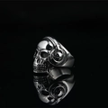 Punk rocker skull ring with headphones in polished silver finish for men and gothic fans - US 7 / Steel Black