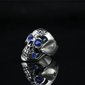 Gothic skull ring in silver titanium steel with blue rhinestones and cross texture - US 7 / Steel Mount Blue Rhinestone