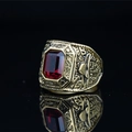 Vintage gold-tone eagle ring for men featuring a large emerald-cut red ruby gemstone - Gold Red