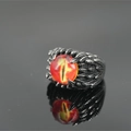 Gothic dragon eye ring with feather texture and orange pupil stone on reflective surface - US 8 / Orange