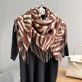 Brown and ivory animal print knit scarf with fringe trim on indoor display - 100x100cm / Brown Red And White Zebra