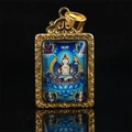 Golden Thangka Buddha pendant with intricate floral relief on a deep blue background - Mahasthamaprapta (Horse) / Pendant Only (Without Chain) / Gold