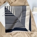 Elegant black and cream geometric stripe silk square scarf styled on a beige shirt - 68cmx68cm / Black