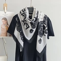 Elegant black and white scarf with floral polka dots and lightweight tassel fringe - 130x130cm / Natural With Black Edge