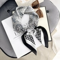 Elegant silk-touch square scarf featuring black and white paisley and houndstooth patterns - Gray