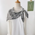 Classic black and white leopard print silk scarf styled as an elegant neckerchief - 87cmx130cmx60cm / White