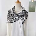 Elegant black and white animal print silk scarf paired with a white shirt and pearls - 87cmx130cmx60cm / Black