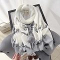 Elegant white and gray linen scarf with black baroque vine patterns on a chair - White and Gray Color Block Baroque Print Style / White
