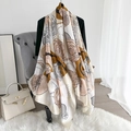 Elegant camellia silk scarf draped on a chair with vintage floral print in warm beige tones - 180*90 / Brown