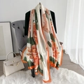 Elegant silk-style shawl with orange floral prints and bright border for summer style - Orange