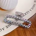 Iridescent rectangular hair claw clip with faceted geometric surface and luxury finish - 13cm / Multicolor