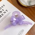 Elegant light purple acetate hair claw clip with a 3D ribbon bow in a glossy finish - Light Purple