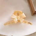 Acetate bow hair claw clip in amber cream finish with elegant geometric texture - Beige - 10.8cm