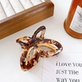Elegant hollow butterfly hair claw clip with tortoise shell pattern and gold frame finish - Brown Tortoiseshell