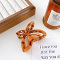 Elegant amber tortoiseshell butterfly hair claw clip with golden metal spring - Brown
