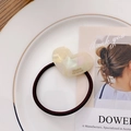 Creamy white heart acetate hair tie with golden lettering and brown elastic cord - Iridescent White