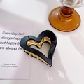 Elegante pinza de pelo con forma de corazón negro pulido y dientes de metal dorado - 6cm / Negro
