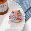 Floral acetate cat hair claw clip with golden details on white porcelain tray - 5cm / Rainbow