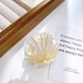 Elegant shell-shaped hair clip in pearl white finish with accent pearl detail - Dazzle White