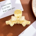 Bow-shaped acetate hair claw clip featuring a yellow and white marble pattern - Hollow Bow Knot (9.6cm) / Yellow