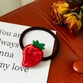 Chic red strawberry hair tie with shiny rhinestones and black elastic cord on leather - Strawberry