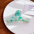 Mint green floral claw clip with acetate marbling and pearl detail in a decorative tray - Large / Dazzling White Green