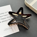 Sternförmige Haarklammer aus schwarzem Acetat mit goldener Metallfeder und Design - 7.5cm / Schwarz