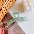 Pinza per capelli a fiore in resina verde chiaro con glitter dorati e margherite - 11cm / Ciano