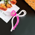 Molla per capelli a forma di fiocco rosa e bianco con dettaglio dorato per donna - Grande / rosa acceso