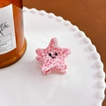 Mini pince à cheveux en forme d'étoile rose et blanche avec smiley sur plateau déco - Étoile de mer