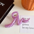 Translucent purple resin wave claw clip for women on an elegant lifestyle desk - Large / Purple
