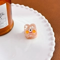 Barrette à cheveux monstre en acétate orange crème sur une élégante assiette blanche - Monstre Rose Iridescent