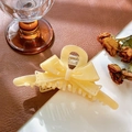 Elegant cream yellow acetate bow hair claw clip for bun hairstyles on a stylish desk - Goose Yellow-13cm