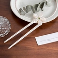 Elegant pearl white acetate flower hair fork with emerald green rhinestone inlay - 15cm / White