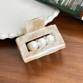 Elegant champagne resin hair claw clip with four white pearls in a hollow square frame - 5.2cm / Light Orange