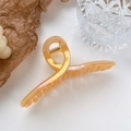 Translucent amber orange acetate hair claw clip with iridescent finish and metal spring - 12.6cm / Iridescent Yellow