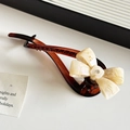 Elegant banana hair clip featuring dark brown resin and white marble bow with crystal - Beige (12.2cm)