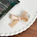 Elegante molletta per capelli a fiocco in acetato rosa pesca con scritte dorate retrò - 5.7 / Arancio chiaro