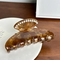 Amber acetate hair claw clip with silk texture and white pearl embellishments - 11cm / Brown