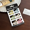 Set of 6 cute heart-shaped macaron hair claws in matte finish on a display card - Set 3