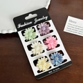 Lot de 6 petites pinces à cheveux marguerites en résine nacrée aux couleurs variées - Style Marguerite