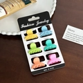 Set mit 6 farbenfrohen, matten Macaron-Minispangen auf einer schwarzen Schmuckkarte - Geometrischer Stil / Set 28