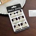 6-piece set of mini pearl hair claws on display card for elegant styling - Set 16