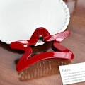 Glossy red star-shaped hair claw clip on wooden table for elegant hairstyles - Star Claw Clip (10.5cm)