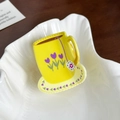 Yellow coffee cup hair claw with purple tulip pattern and wavy base in acrylic material - Yellow